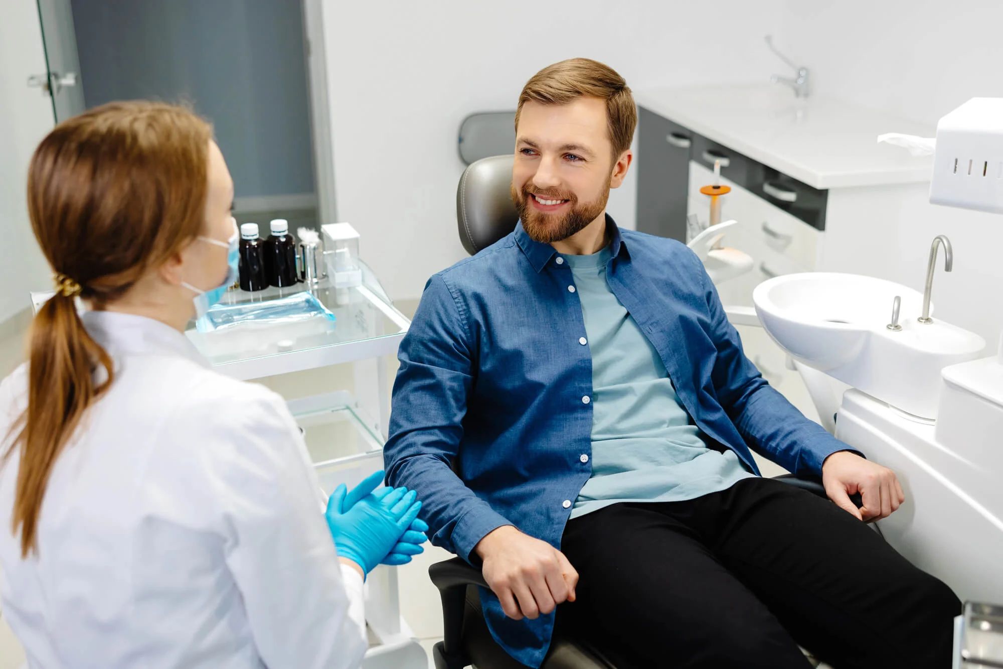 doctor-talking-about-dental-implant