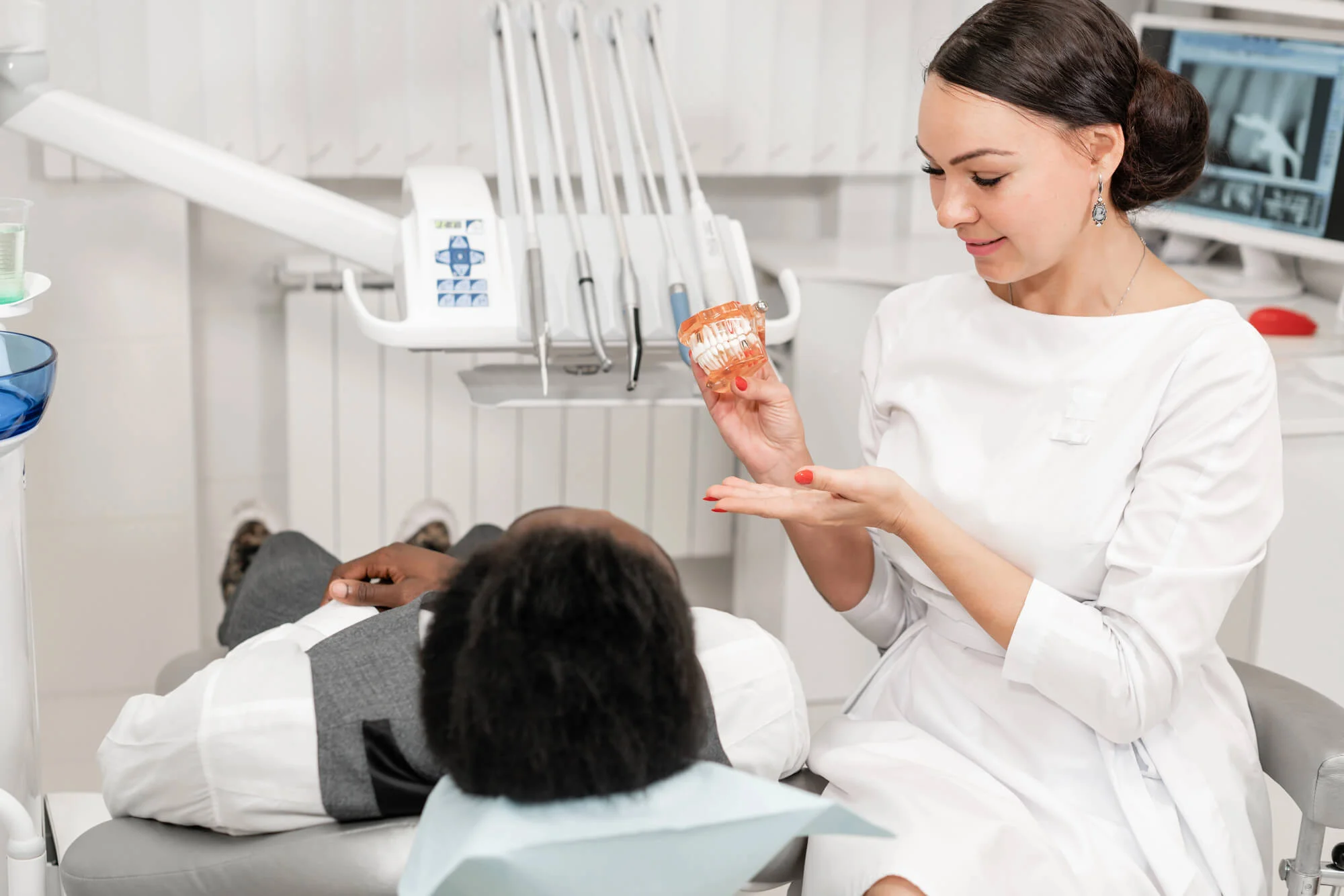 Dentist discussing oral health during comprehensive dental care in New Smyrna Beach